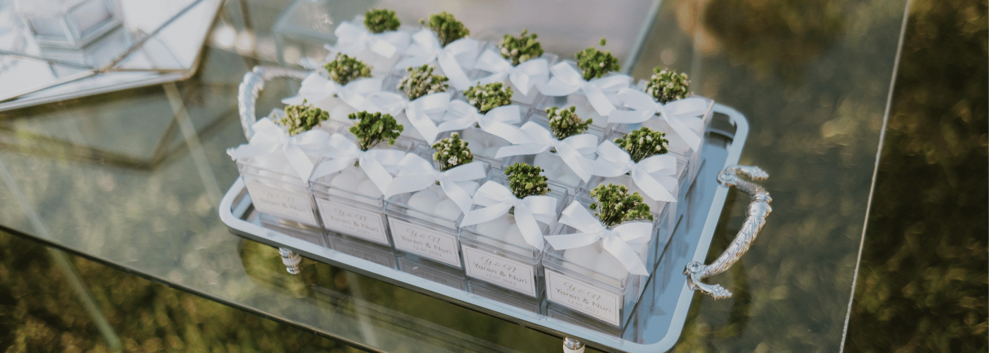 DIY wedding favour boxes and bags with personalised ribbons and stickers