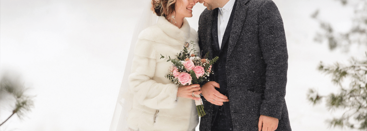 Elegant winter wedding setup with warm lighting and soft decor